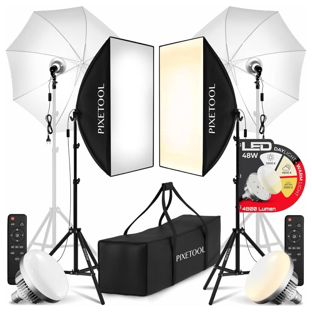 Nouveau projet(2) Two softbox lights on stands with LED panels, plus floor bulbs, remotes, and a black carrying bag for a photography studio kit.