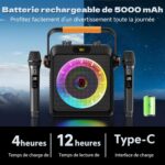 Portable speaker with two wireless microphones and a colorful rainbow LED ring in the center. Battery banner text hints at 5000 mAh capacity (advertisement).