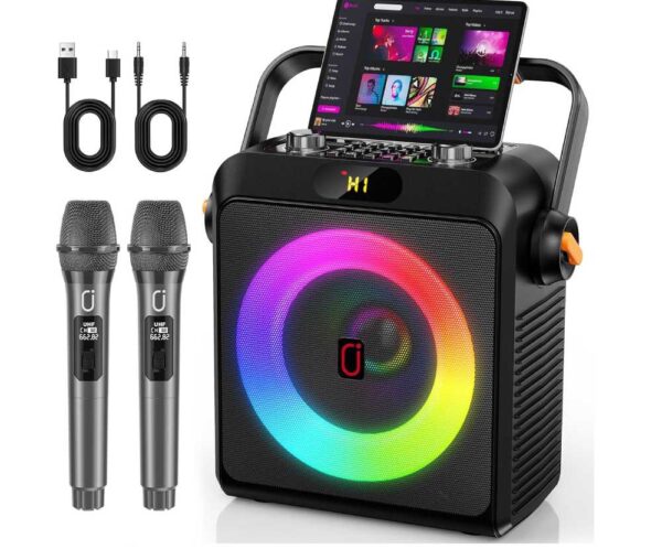 Portable karaoke speaker with rainbow LED ring, tablet screen on top, two wireless mics, and cables included