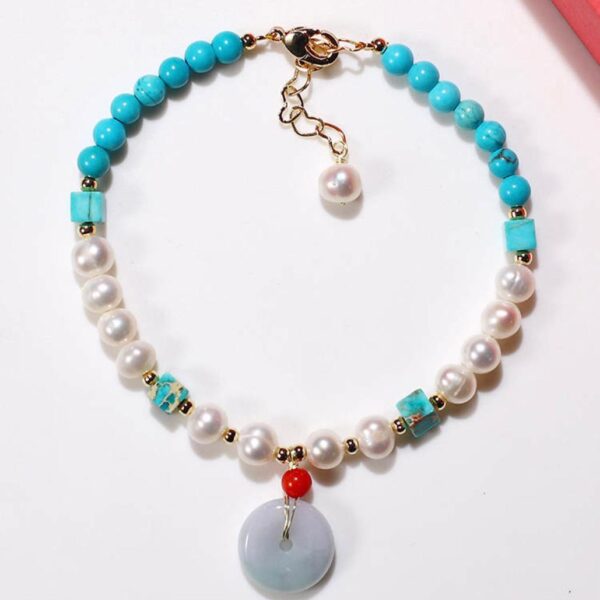 Bracelet en turquoise, perles d’eau douce, jade donut, corail rouge et Or plaqué