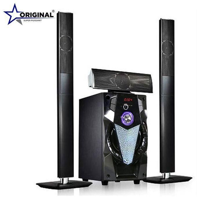 1 (11) Brand-name 2.1 speaker system: two tall black satellites and a central subwoofer with a purple-lit control knob, logo in top-left.
