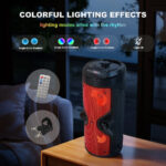 Portable speaker with red LED lighting and two circular glow icons; remote and strap shown beside for scale and control.