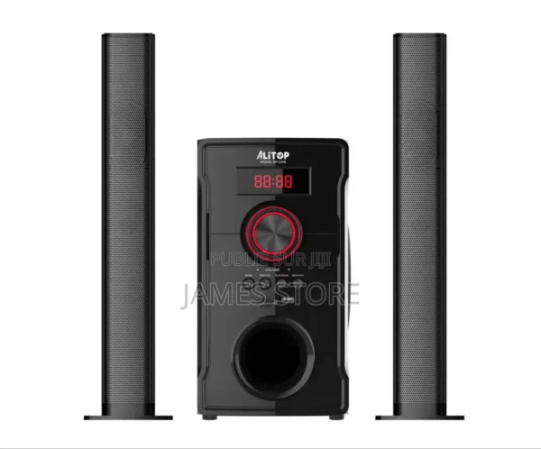 Black home theater speaker system: two tall satellite speakers flanking a central subwoofer with a red-lit control knob and LED display.