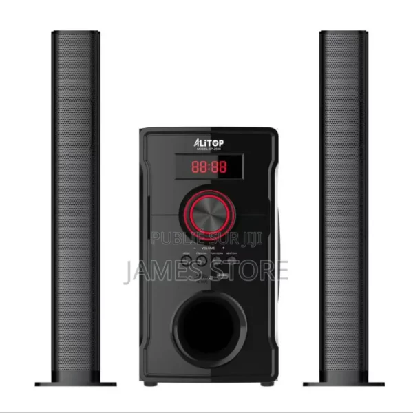 Black home theater speaker system: two tall satellite speakers flanking a central subwoofer with a red-lit control knob and LED display.